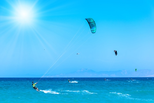 Kite,Surfers,Ride,On,Waves,On,Beach,In,Aegean,Sea,