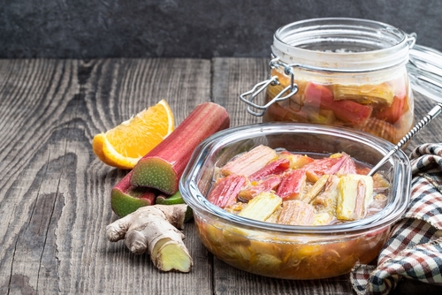 Homemade,Rhubarb,Stew,In,Glass,Bowl,On,Wooden,Table